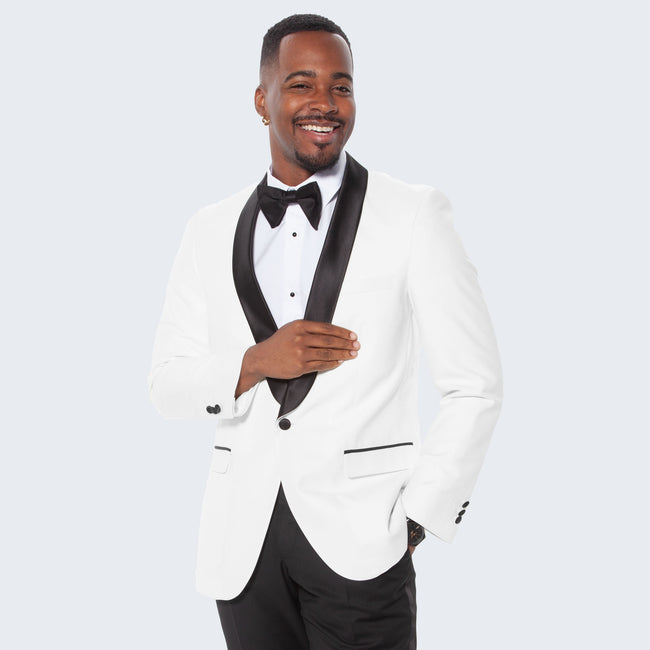 man wearing whit tuxedo jacket with black trim at wedding