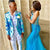 prom couple with guy wearing aqua blue prom suit jacket