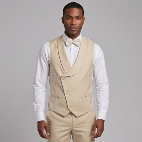 Man wearing a ivory vest over a white shirt with a bow tie against a gray background
