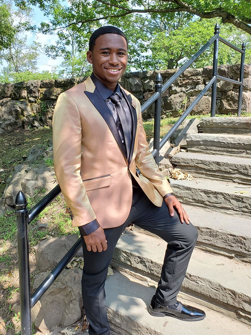 guy wearing rose gold prom suit jacket