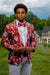 guy wearing red floral prom suit jacket