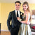prom couple with guy wearing black and gold prom suit jacket tuxedo