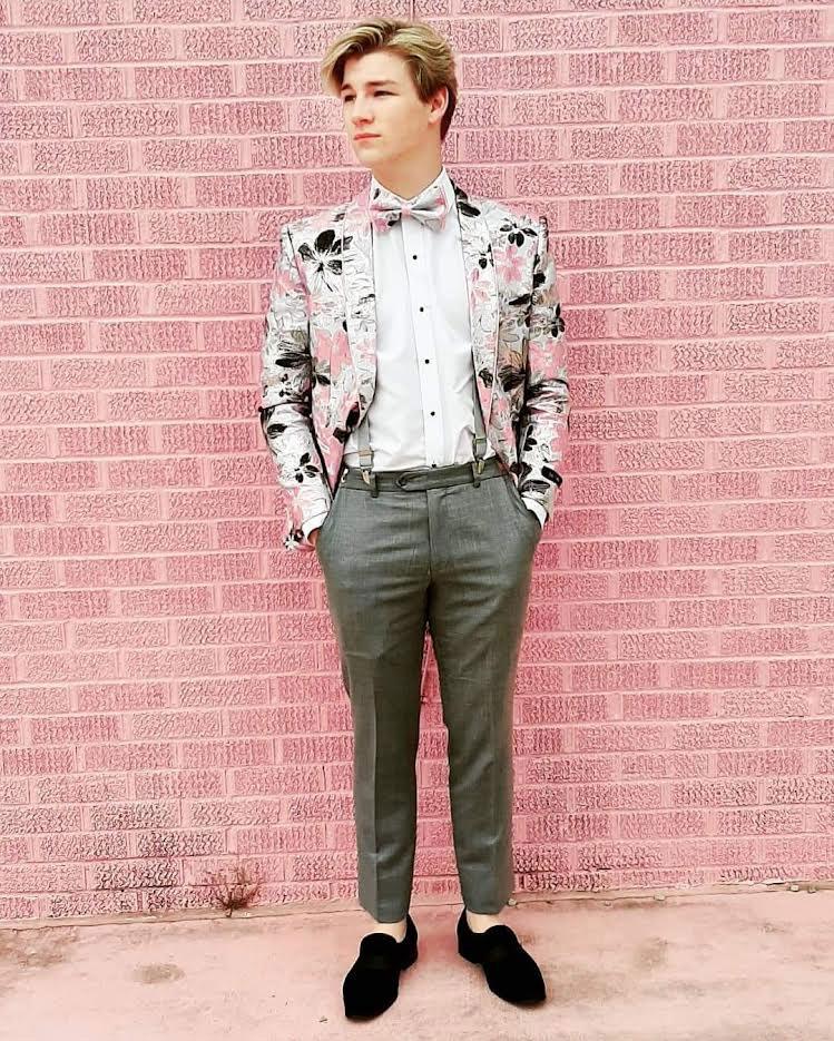 guy wearing pink grey and silver prom suit jacket