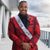 guy wearing red floral prom suit jacket with prom court sash