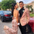 Prom couple with guy wearing rose gold prom suit jacket