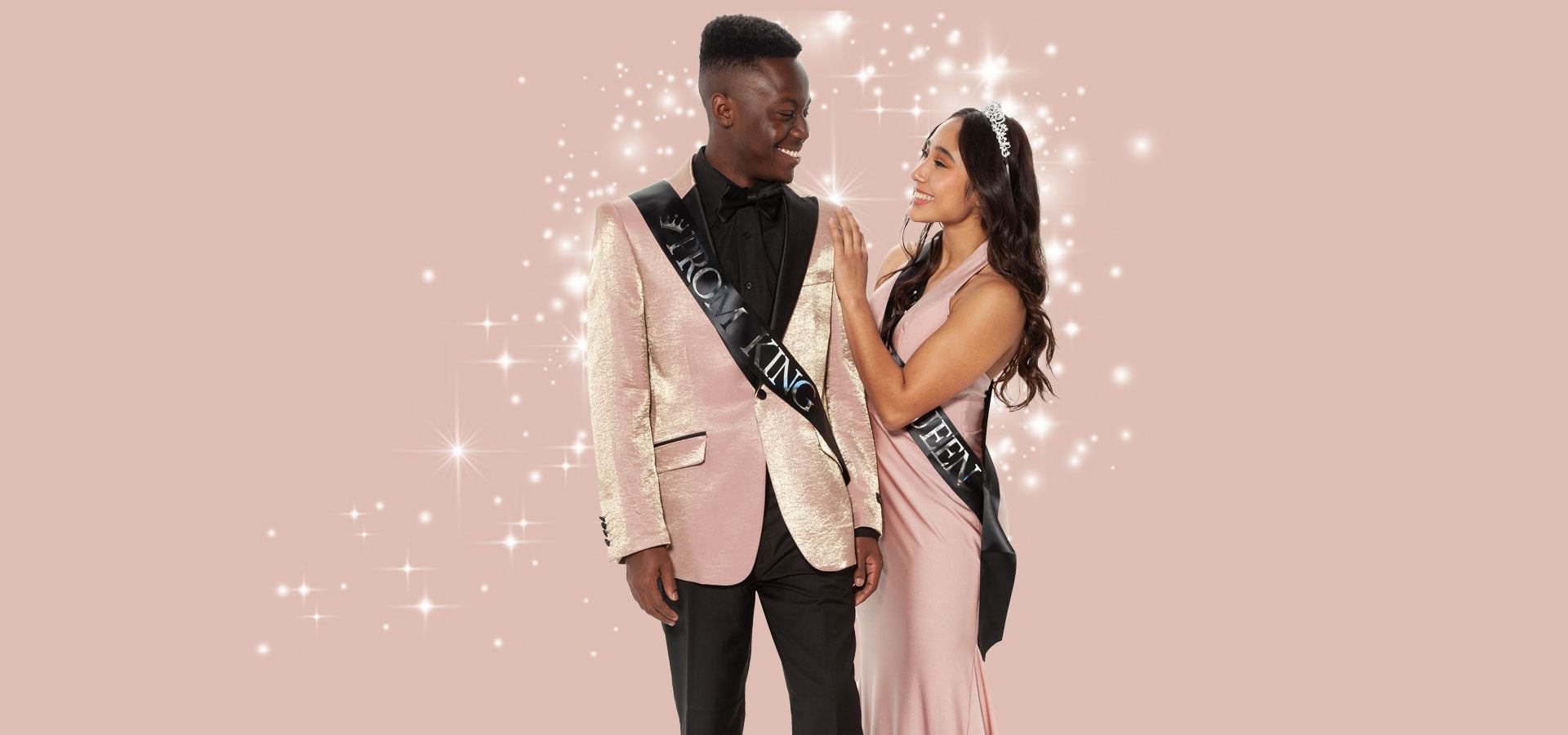 Prom King and Queen wearing a blush pink tuxedo and gown — Perfect Tux Prom 2026 collection