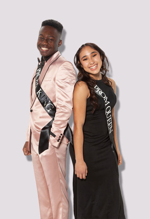 Prom couple guy wearing a pink prom tuxedo