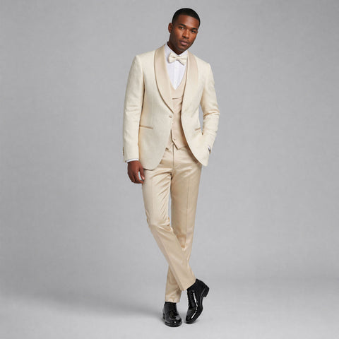 man wearing a pattern ivory tuxedo