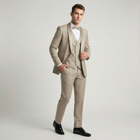 Man wearing a champagne shawl tuxedo with a white shirt on a light gray background